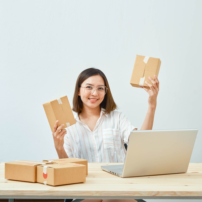 Women selling products online at home.